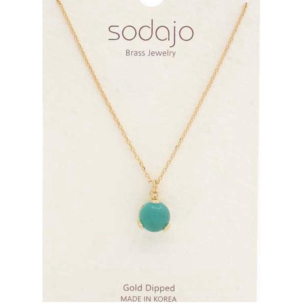 Necklace with a rhinestone
